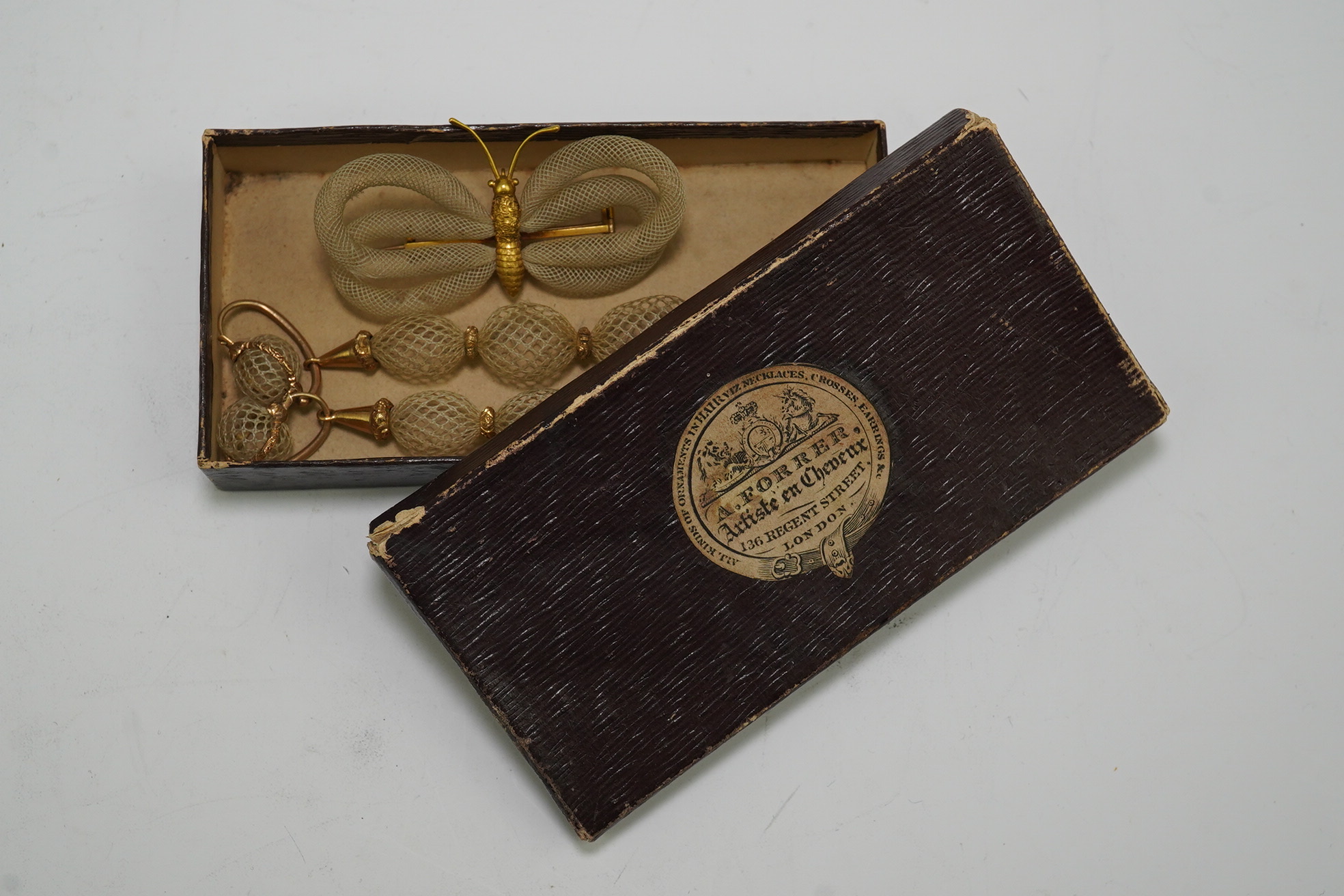 Antoni Forrer (1802/3-1889), 'Artiste en Cheveux', 136 Regent Street, London. A pair of gold mounted hairwork drop earrings and a butterfly brooch